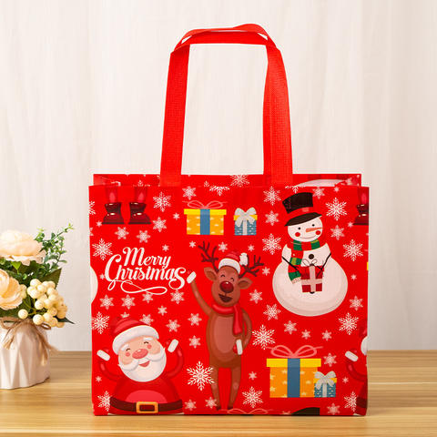 Christmas-Gift-Bag-Manufacturer-Wholesale-Water-Spun.png_480x480.jpg Non-Woven Christmas Gift Bags with Handles - Custom Logo
