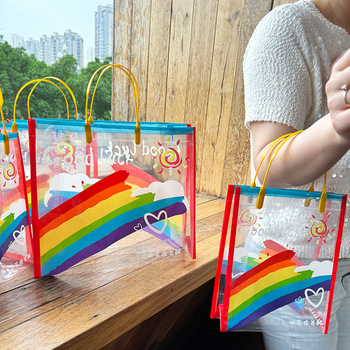 Rainbow-Cartoon-Pattern-PVC-Handbag-Handles-Closure.jpg_350x350.jpg Rainbow Cartoon PVC Gift Bag - Transparent Small, Custom Size